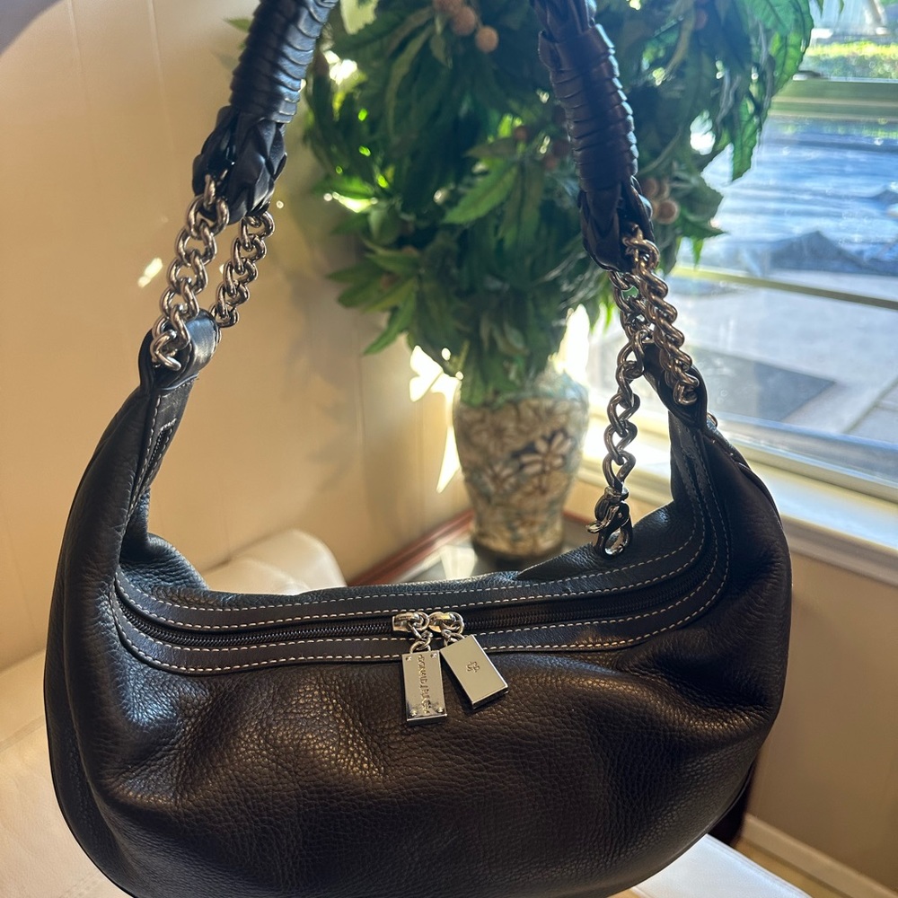 Plicate leather bag made in Italy